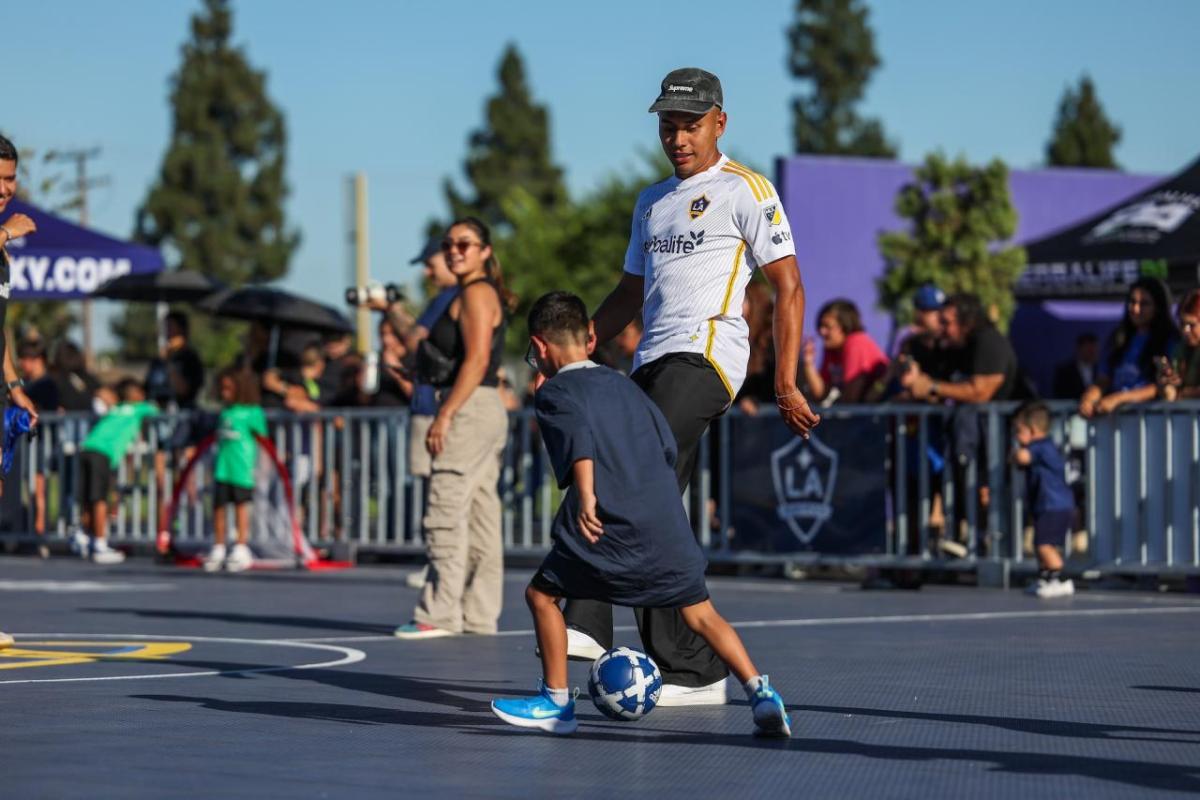 LA Galaxy players Jalen Neal, Edwin Cerrillo, and Mauricio Cuevas led a soccer clinic for more than 50 youth soccer players from Rio Vista Elementary.