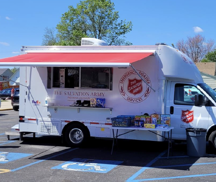 FedEx canteen truck set up with a food and drink station 