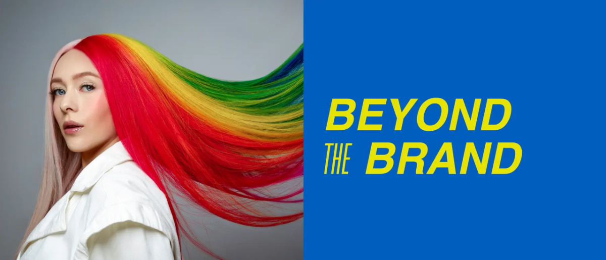 A person with long rainbow hair and the phrase: Beyond the Brand
