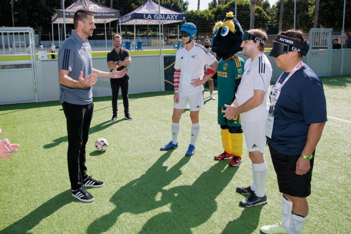 LA Galaxy's Thomas Braun speaking with athletes from the USA Blind Soccer Men’s National Team at the demonstration at Dignity Health Sports Park.