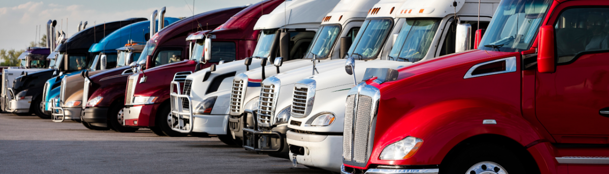 line of big trucks