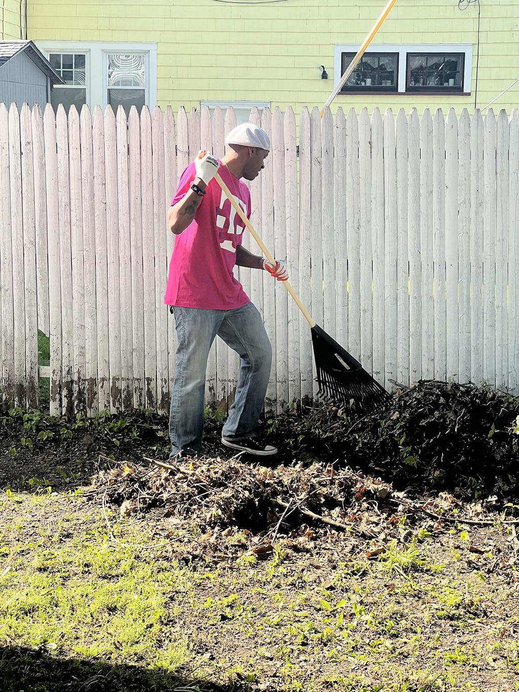 Person raking yard