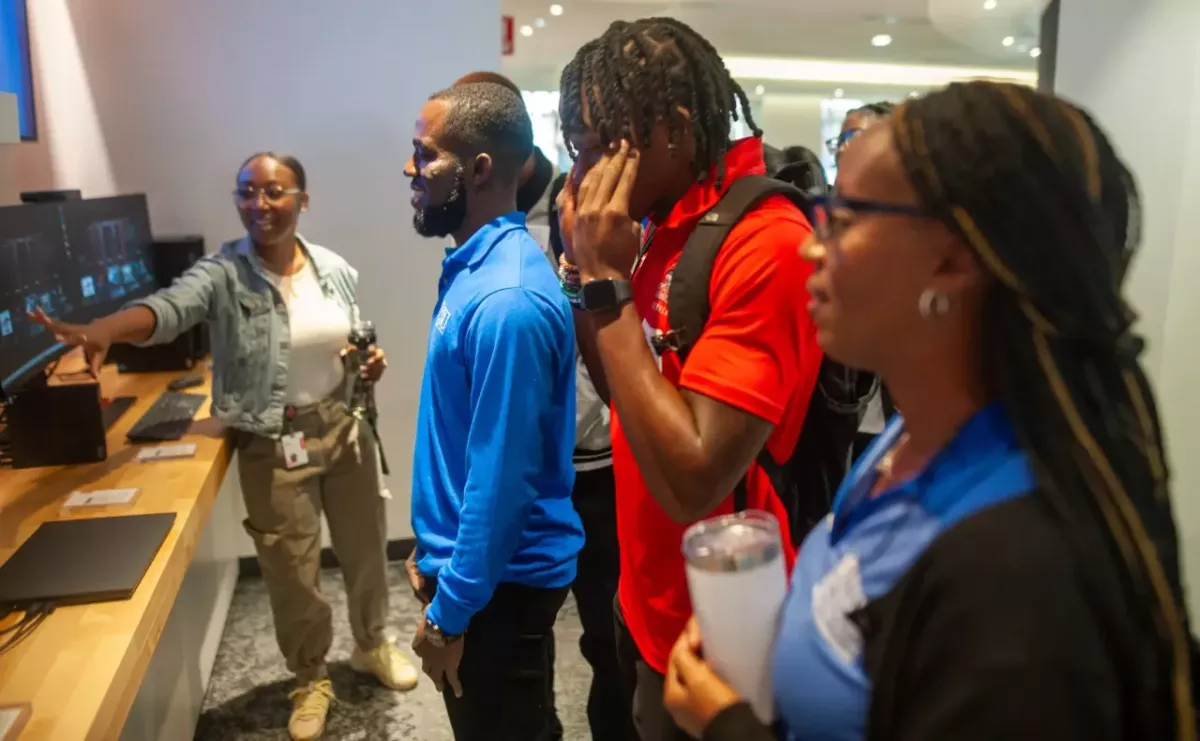 People looking at computer screens 