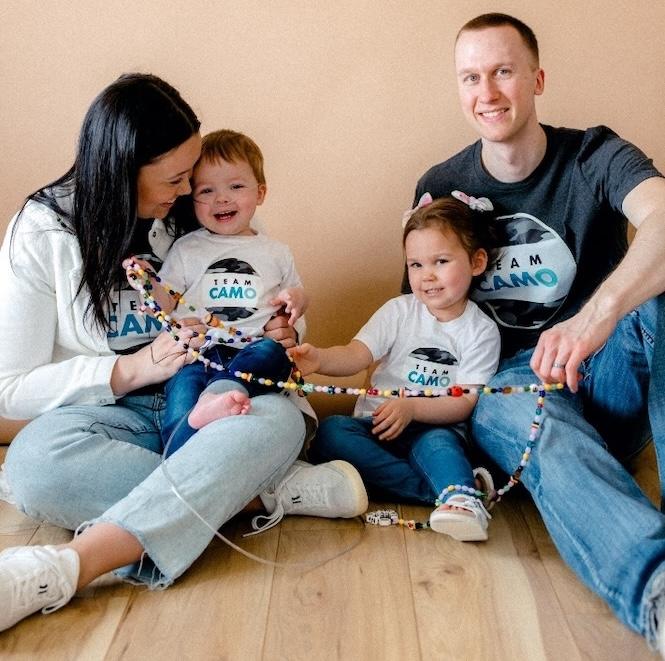 Cameron shown with his family.