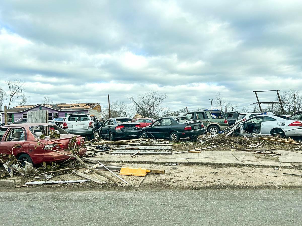 Damaged cars and debris from a tornado