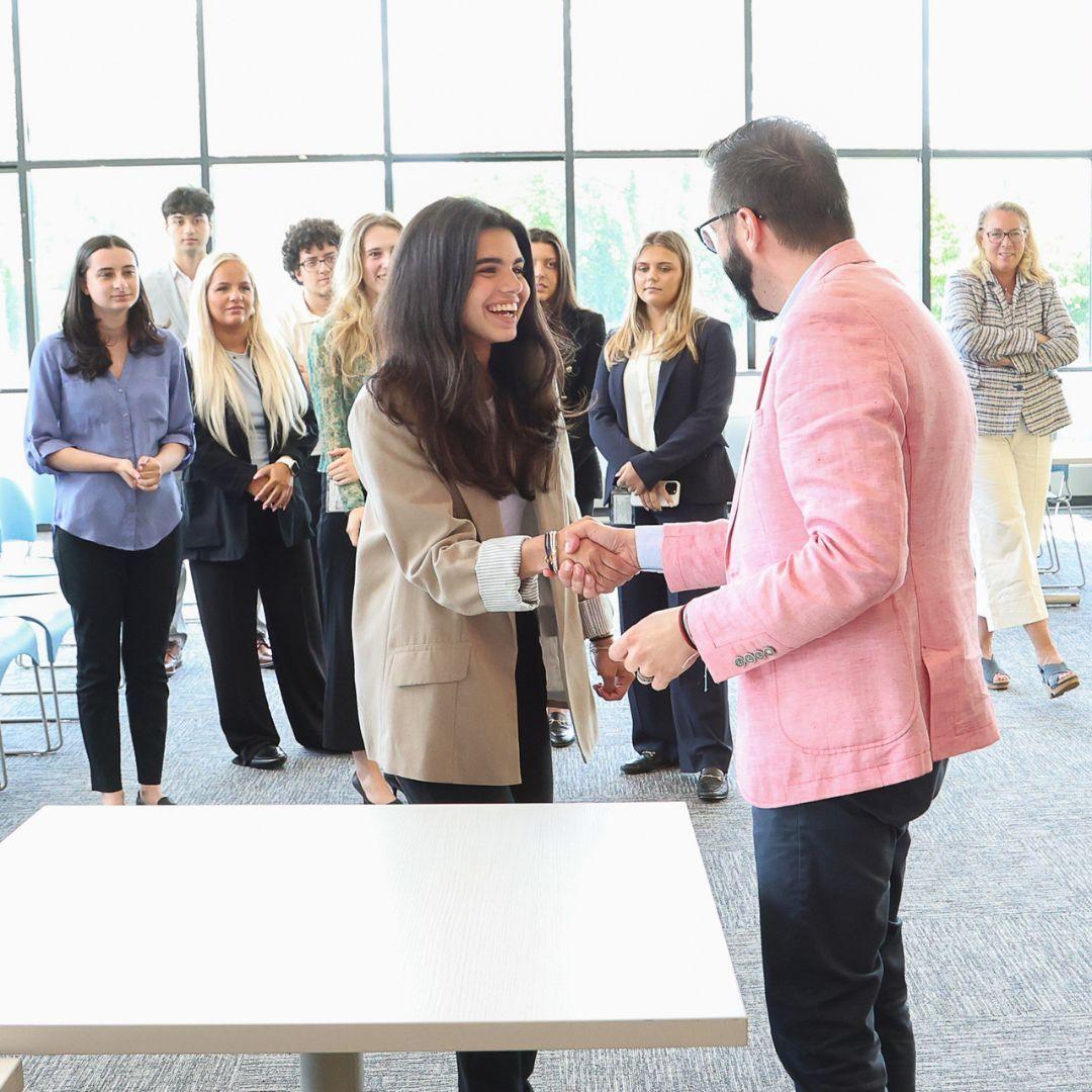 Two people shaking hands