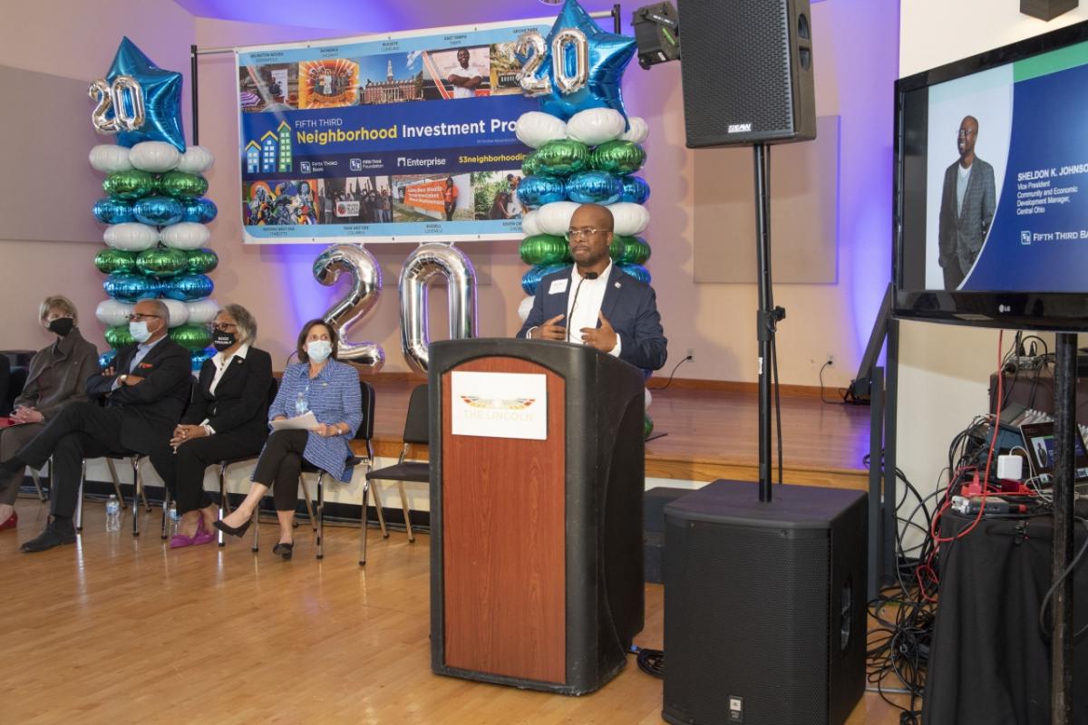 Man speaking at Columbus Neighborhood Investment Program announcement