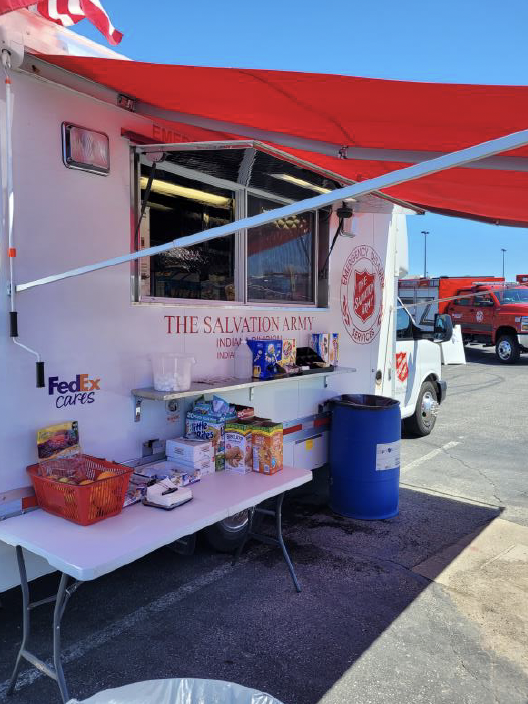 FedEx canteen truck set up with a food and drink station 