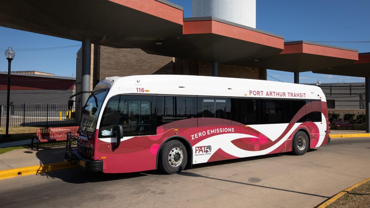 electric bus in front of terminal