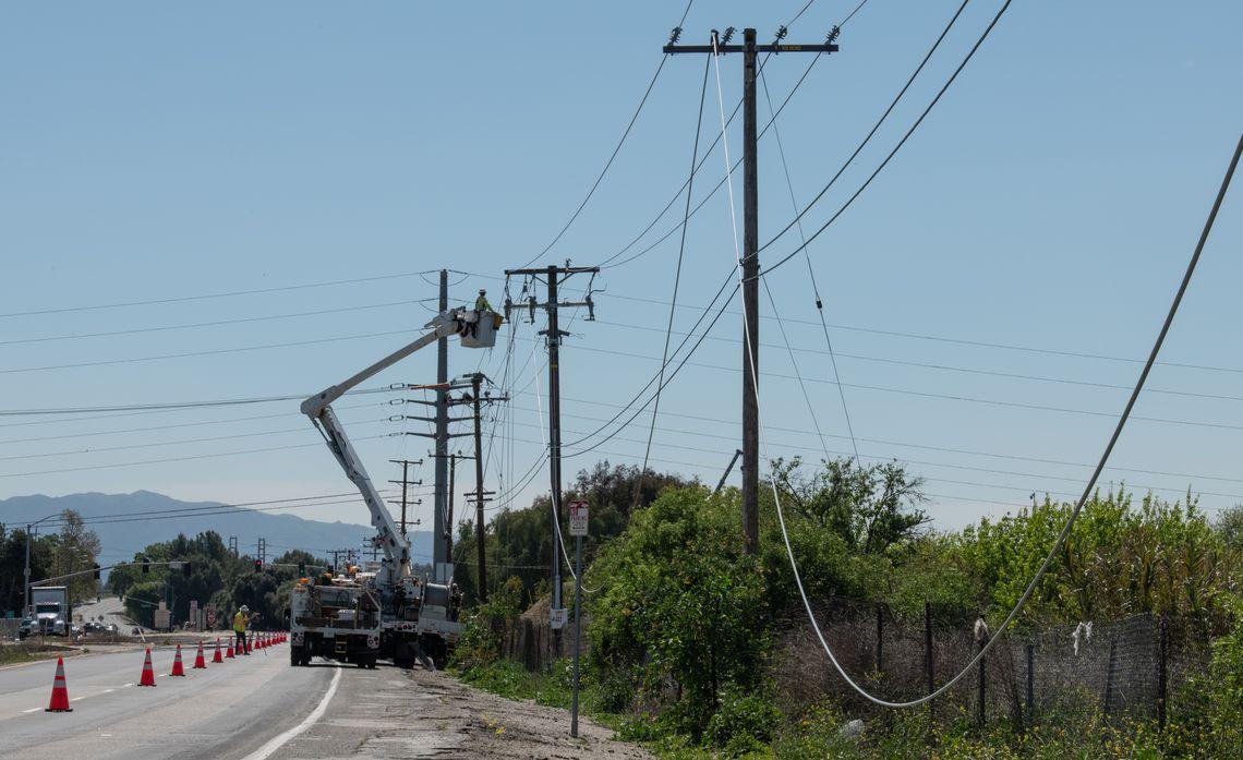 Professional working on an overhead power line