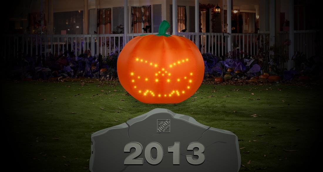 Jack 'O Lantern sitting on top of a stone marked 2013.