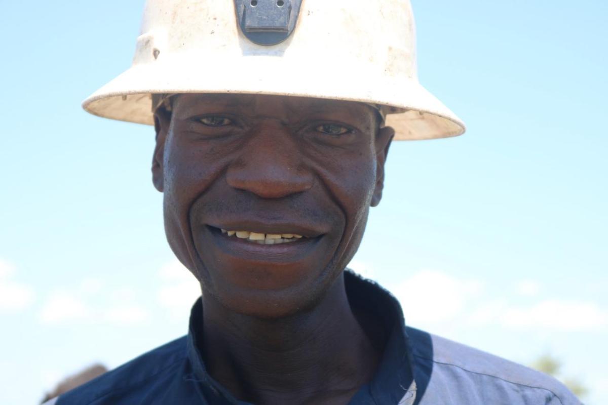 A 52-year-old farmer in the Lukanda Agriculture Camp greets our team. "Because of the dry spell, we will only be eating one meal per day," he tells me.