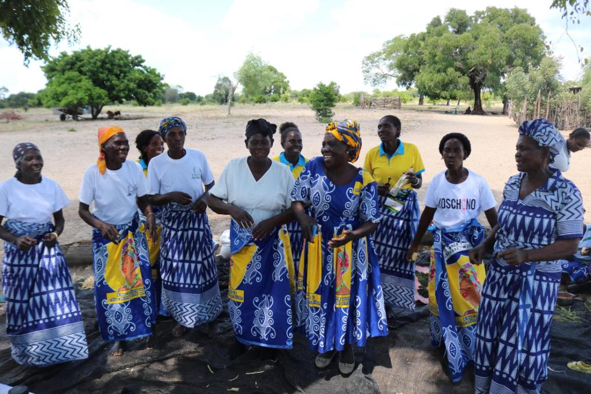 Mrs. Makina sings and dances alongside the other ladies in the Kaande Camp.