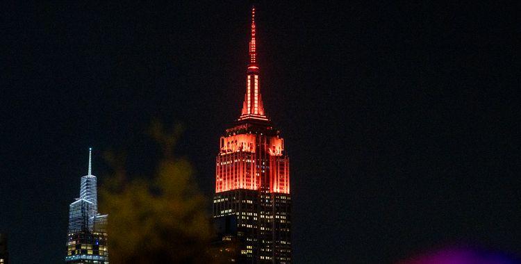 Empire State Building lit up in JBL orange.