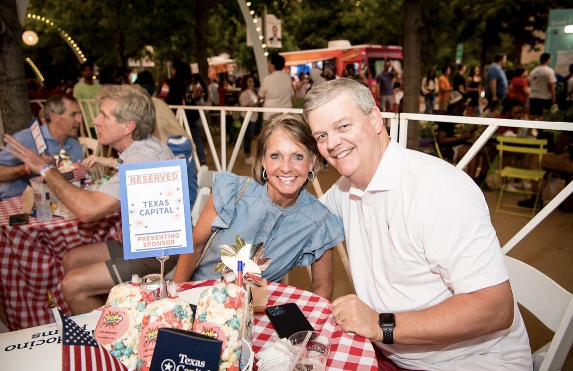 Two people sitting together at a table