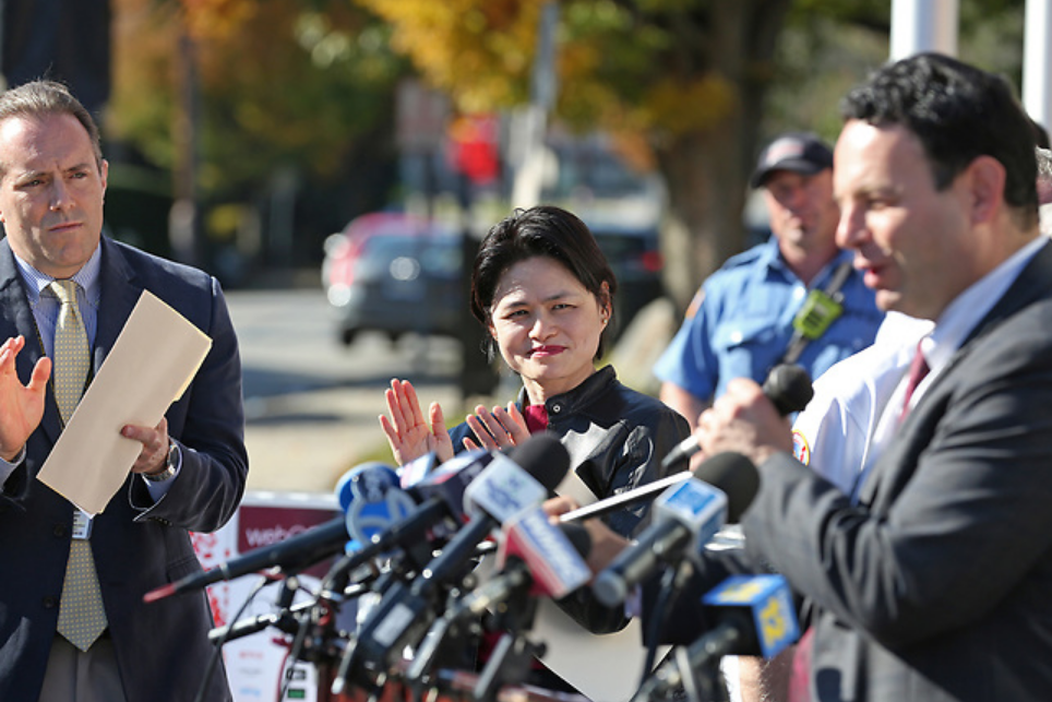 LG Electronics USA SVP Peggy Ang, center, joins Paterson Mayor Andre Sayegh (r) and Cresskill Schools Superintendent Michael Burke (l) to announce LGs support to help their communities recover from Ida. 