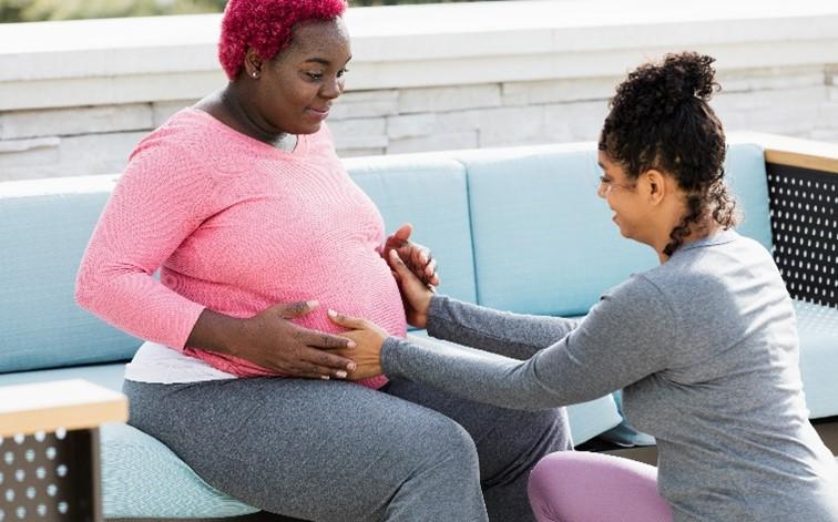 pregnant woman receiving maternity care