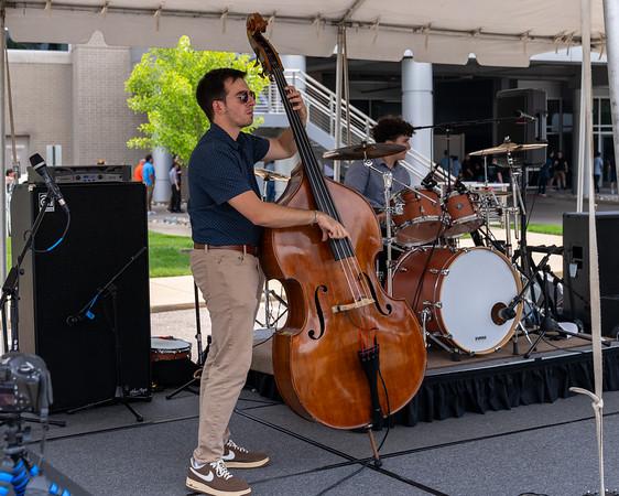 HARMAN musician playing an upright bass.