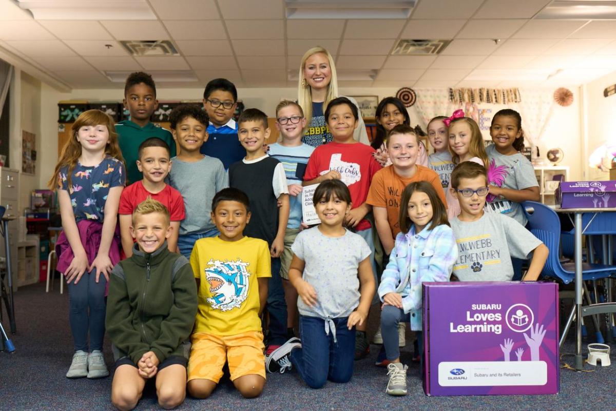 Group photo of students in a classroom