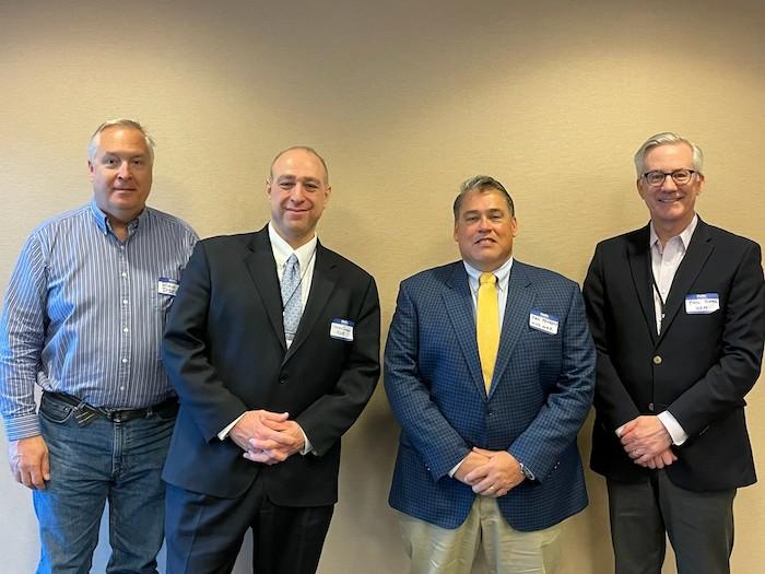 Photo of four graduates of the Supplier Diversity Mentorship Program.