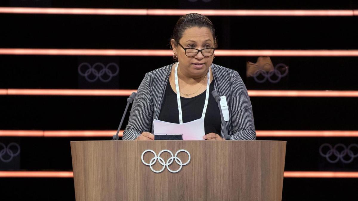 Person stood at a podium giving a speech