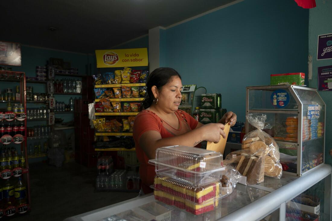 women at cash register