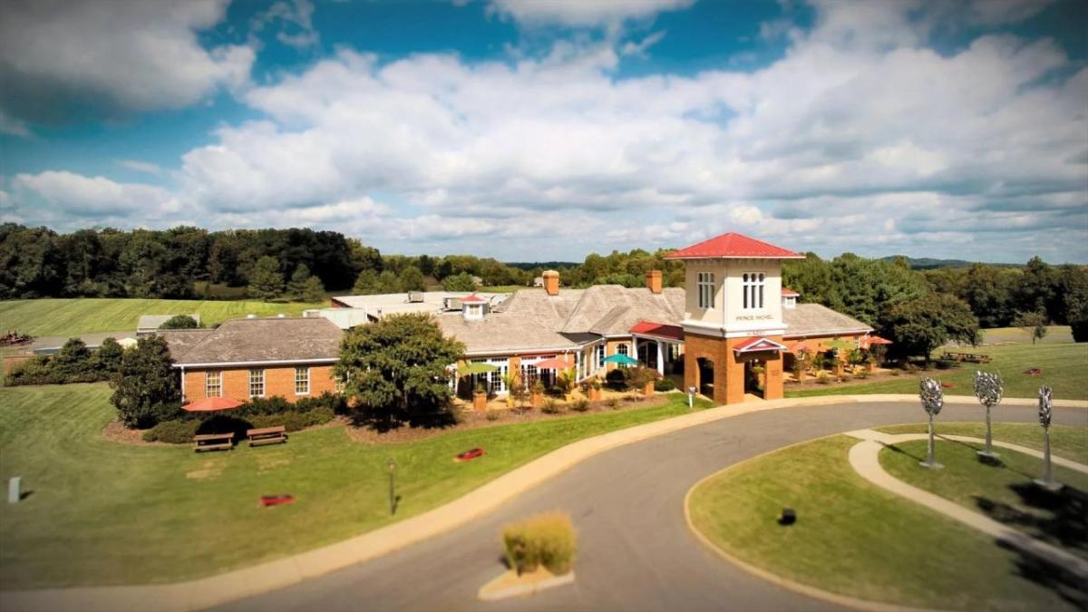 Aerial view of the exterior building and grounds of the Prince Michel Vineyard.