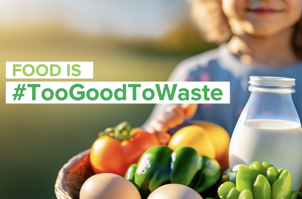 Text Food is #TooGoodToWaste over photo of young person holding basket of fresh food