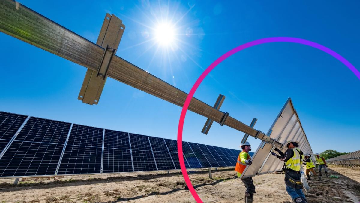 Workers installing solar panels