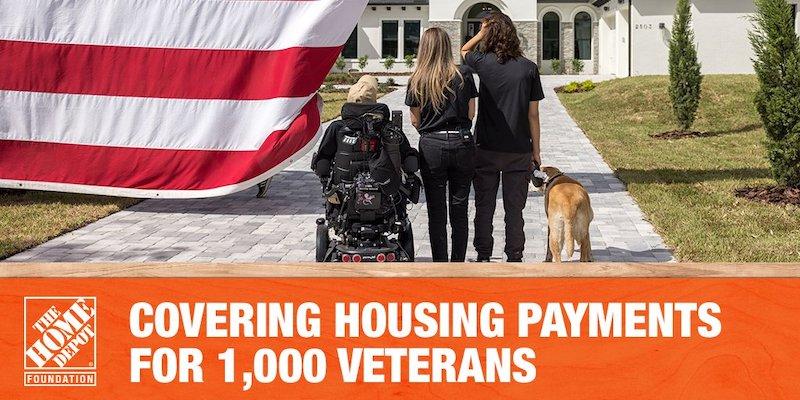 Veteran family shown in front of a house with an American flag.