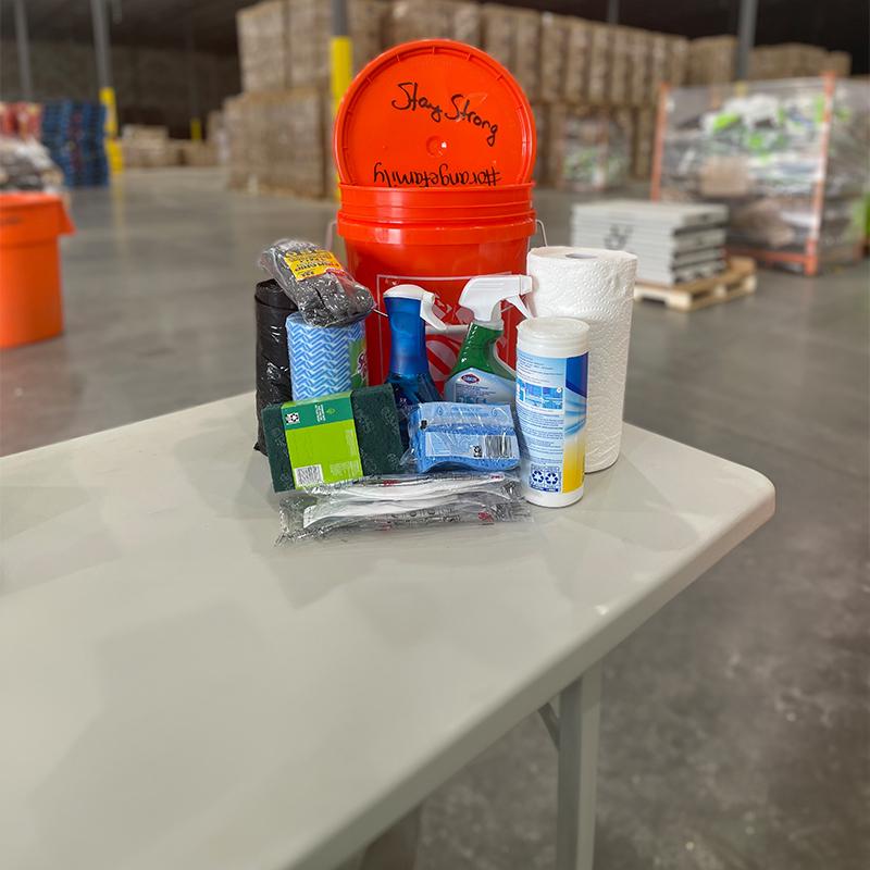 The Home Depot Disaster kit: bucket, trash bags, sanitizer and face mask.