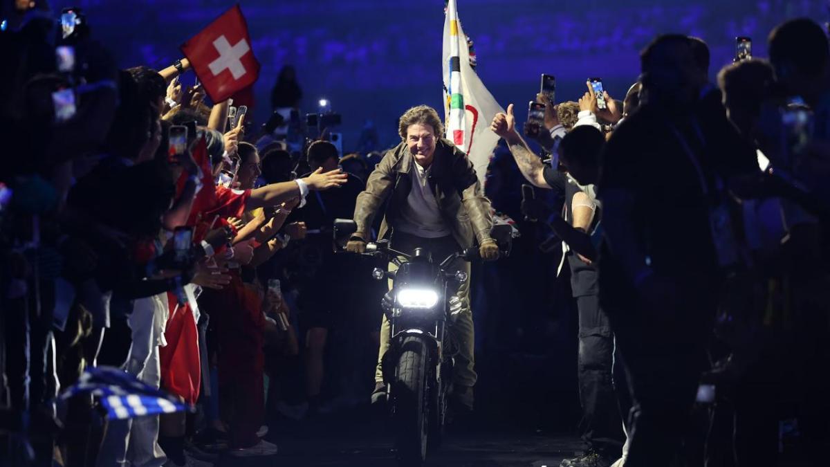 Tom Cruise riding a motorbike 