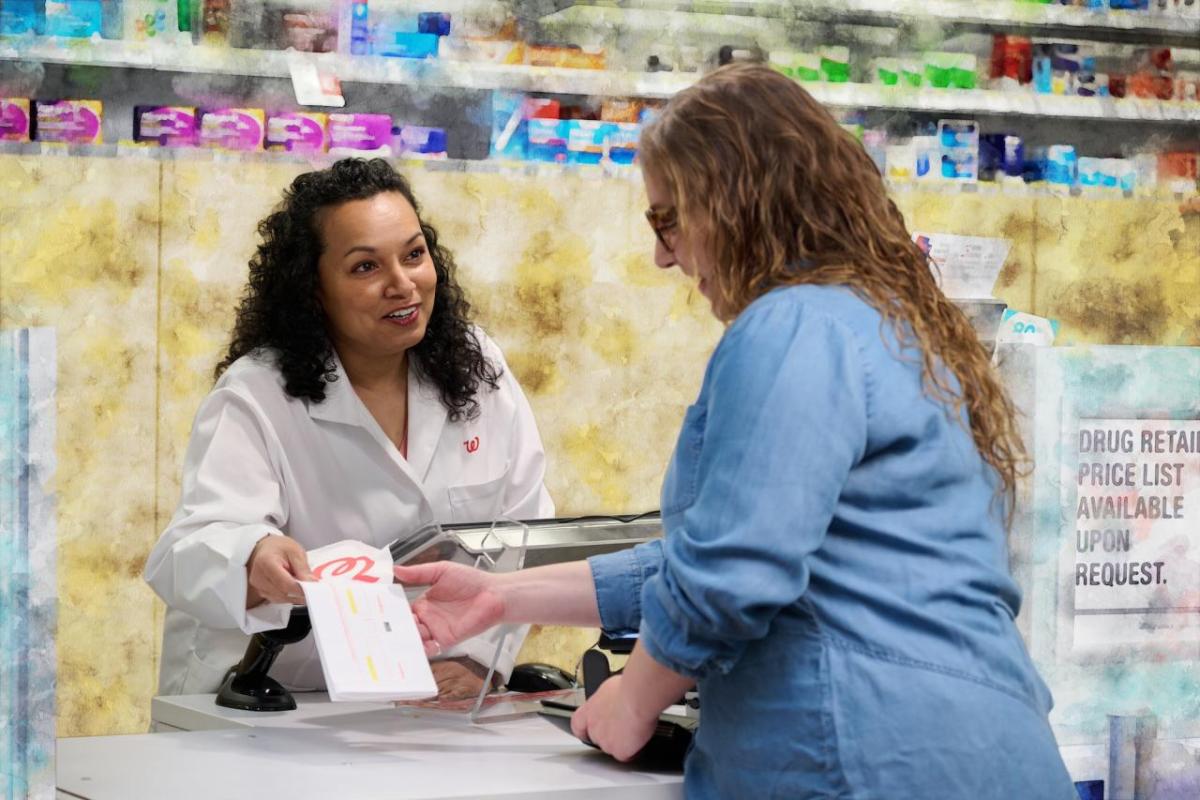 A person passed a prescription over the counter 