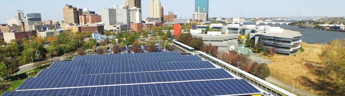 Solar panels with a city background