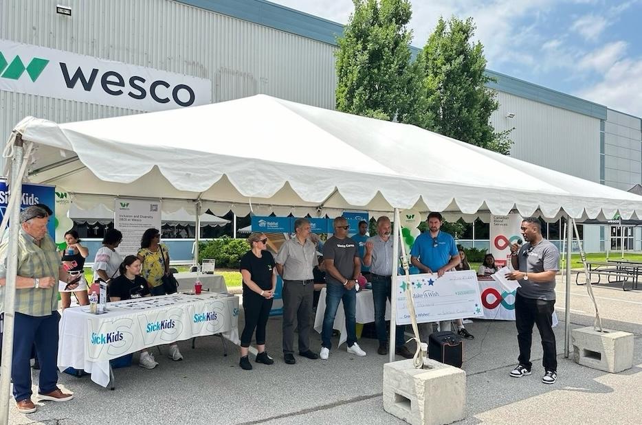 Sick Kids org. tent set up outside of the Wesco facility.