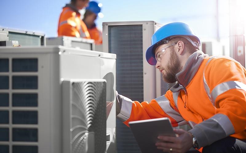 Chemours employee working on an HVAC system