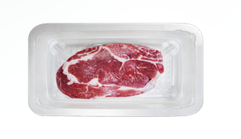 A cut of meat in a clear sealed package.
