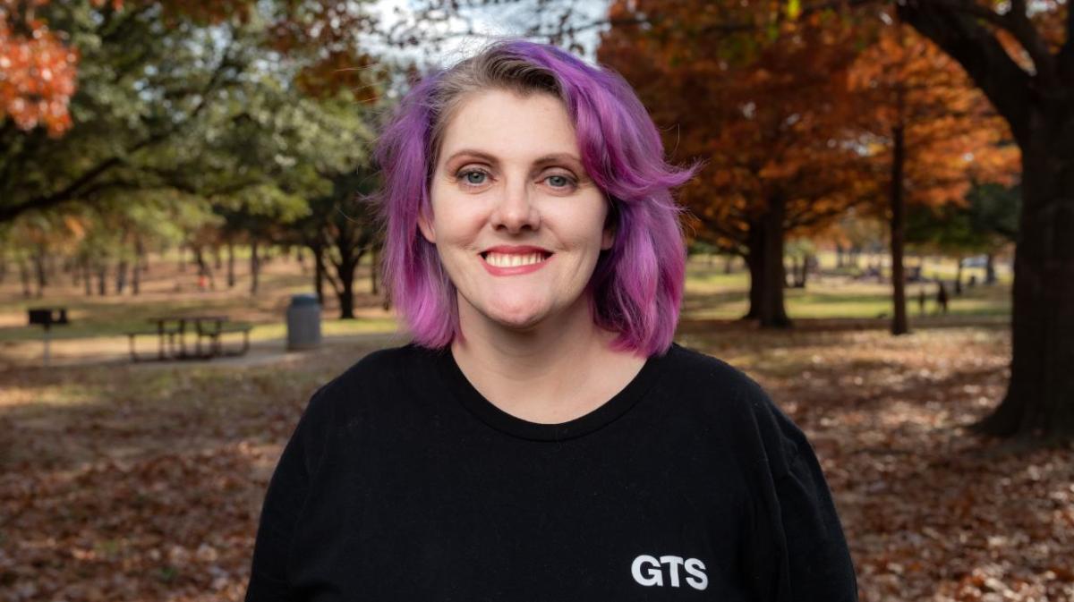 Portrait of Crystal Morris with trees in the background