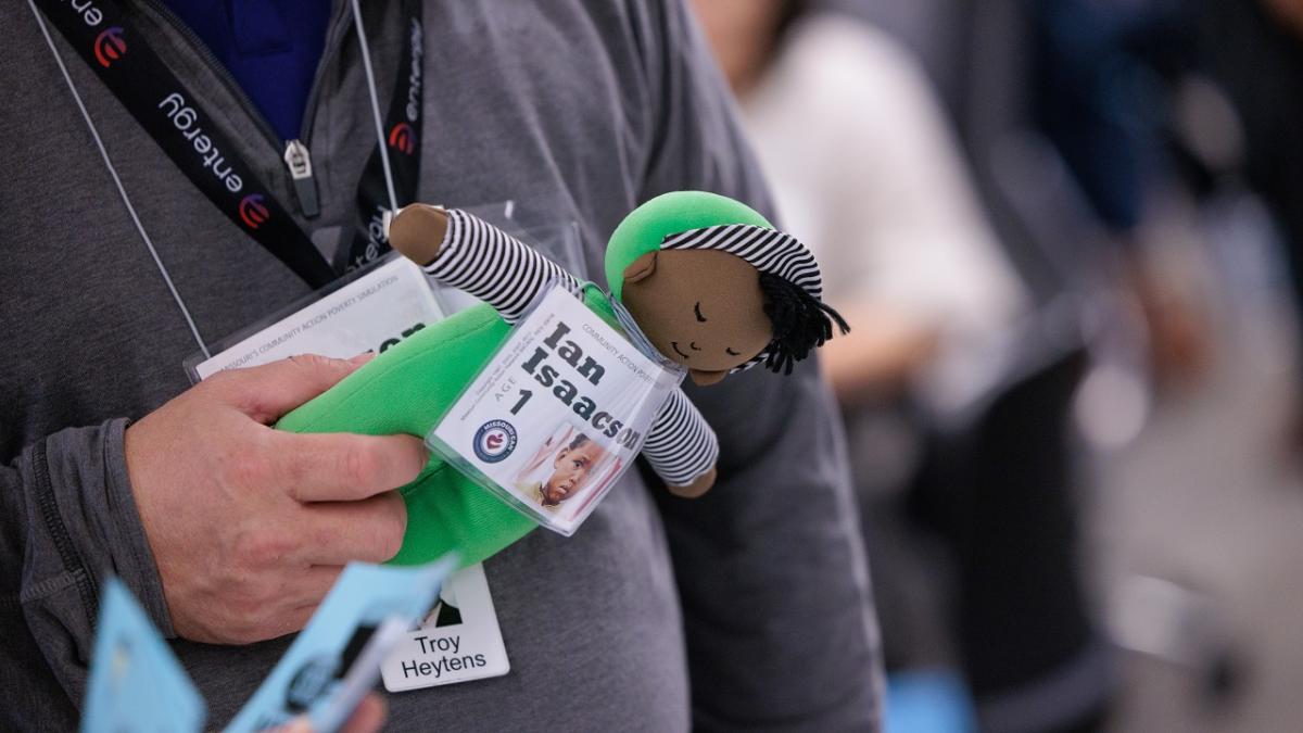 person holding a doll at event