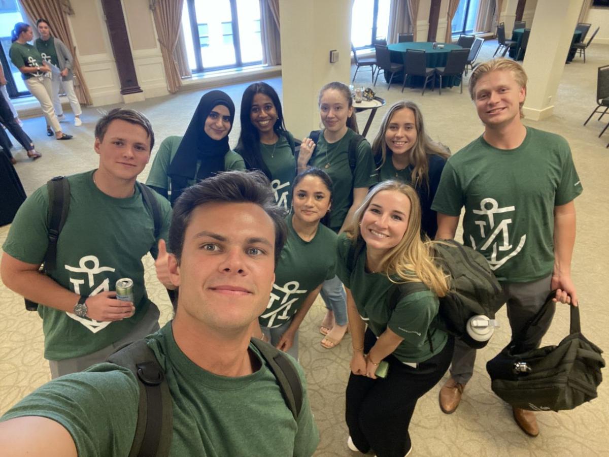 interns smiling together