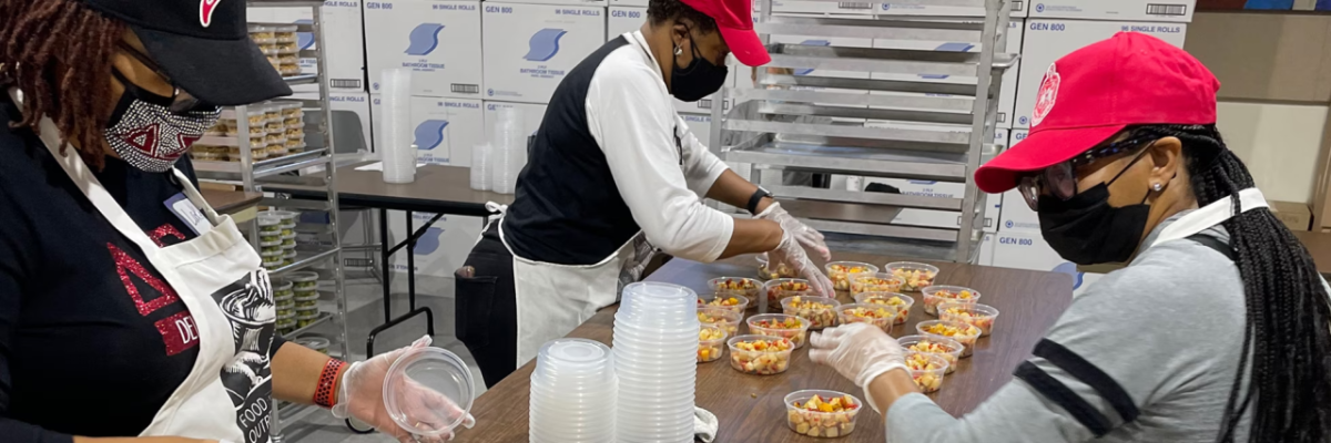 Volunteers prepping food