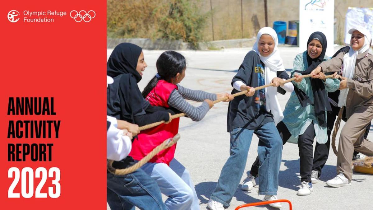 "Annual Activity Report 2023" next to smiling people playing tug-of-war with a rope.