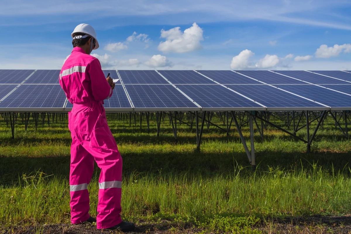 worker working on solar panels