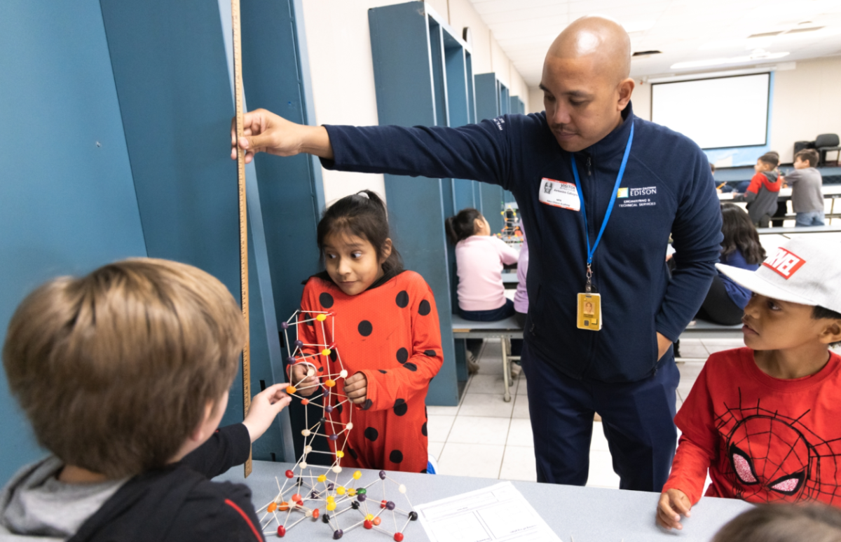 Kids getting their tower measured